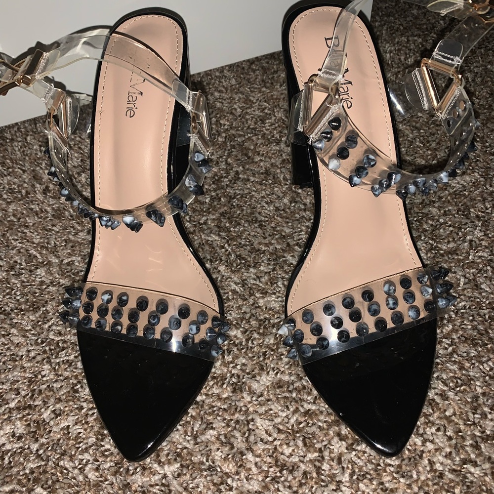 Pointy toe spiked black heels